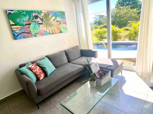 The Happy Lapa *New Poolside Condo in Jaco, Costa Rica*