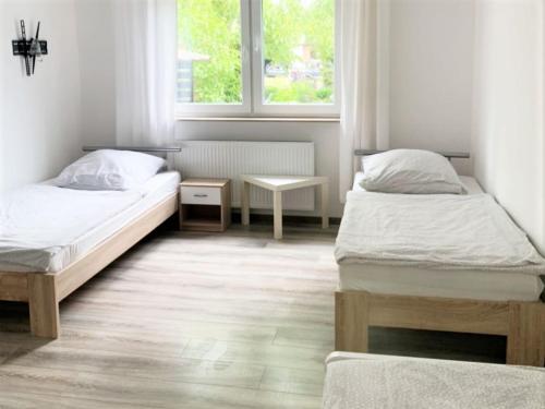 Work & Stay Troisdorf 3.4km von Lind entfernt