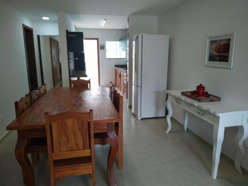 Apartamento praia Taperapuan com churrasqueira privativa