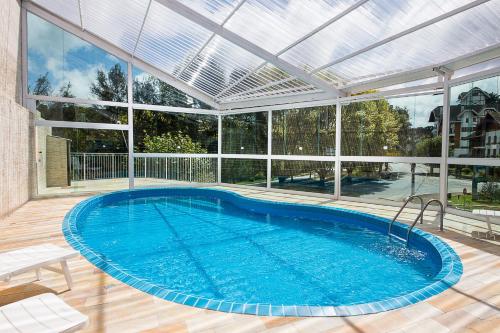 Swimming pool, Hotel Euro Suite Campos do Jordao By Nacional Inn - A 800 metros da Vila Capivari in Campos Do Jordao