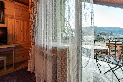 Balkong/terasse, Emerald House in Mykulytsjyn