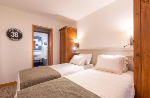 Arc 1950 Appartement 4 personnes Ski aux pieds