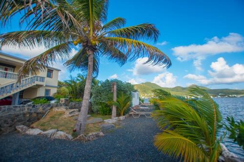 정원, Cosy Waterfront Private retreat by CoconutGardenSxm in 마리고트