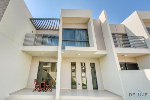 Captivating 3BR Townhouse at DAMAC Hills 2 Dubailand By Deluxe Holiday Homes