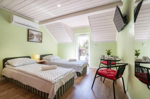 Double Room (1 Adult + 1 Child)