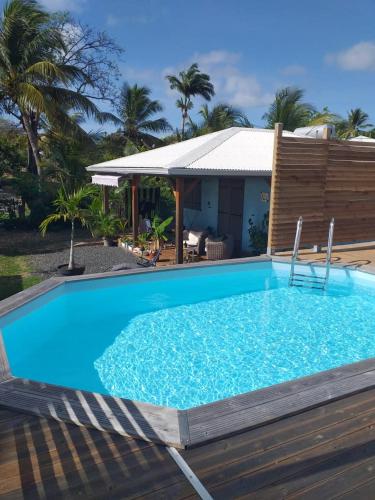 Bungalow d'une chambre avec piscine partagee jardin amenage et wifi a Saint Francois - Location saisonnière - Saint François