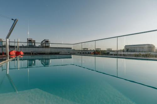 Brucklyn Suites - Tap to explore photos