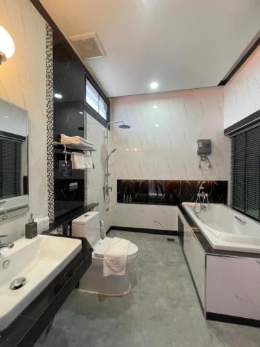 Bathroom, Phutara Resort and Spa in Nong Ki