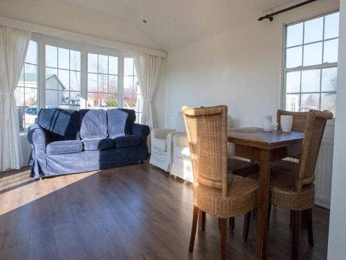 Detached chalet on a holiday park with two terraces, near Alkmaar in Hensbroek
