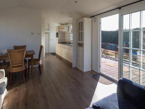 Detached chalet on a holiday park with two terraces, near Alkmaar in Hensbroek