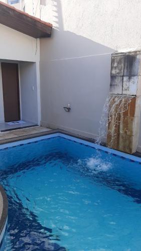 Casa em Natal Cond. Fechado com Piscina-03 Suítes