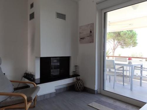 Balkons/terase, Hidden beach maisonette with exciting view! in Ag. Dimitrios (Attiki)