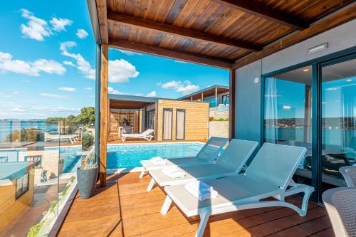 Deluxe 2-bedroom camping villa with sea view terrace and swimming pool