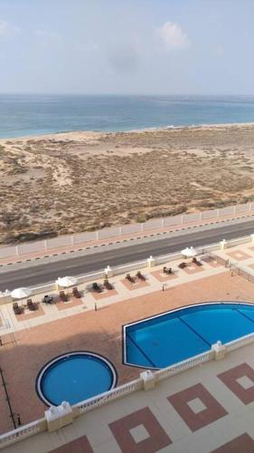 Al Hamra village studio-pool-beach-gym