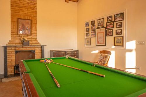 SilverOaks Cottage with Pool Table & Poker Table by StayVista