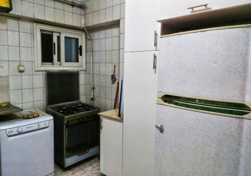 Kitchen, Jessy charming apartment in Heliopolis. in Cairo
