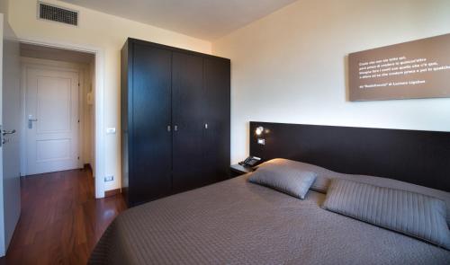Residence Acqua del Conte Room Type - Deluxe Triple Room