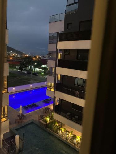 Apartamento 2 quartos home club na praia de palmas