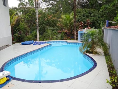 Linda casa com lazer a 500m da praia Guaratuba SP