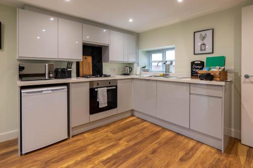 virtuve, Caer Fedwen Barns Dyffryn Cottage King bed self catering with Hot Tub in Llandyrnog