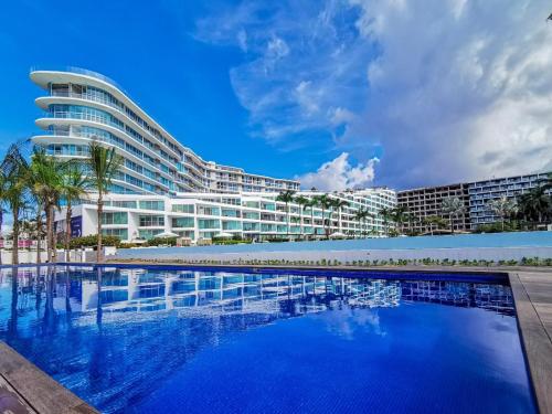 Aria ocean a pie de playa