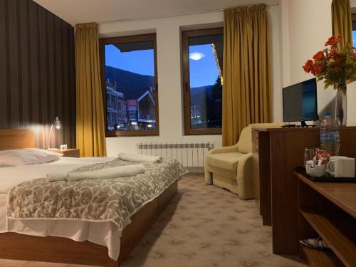 Room in Guest room - Apartment StayInn Granat in Bansko - next to Gondola Lift, perfect for 3 guests Bansko