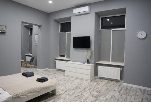 Studio room in Soho Apartments Lviv