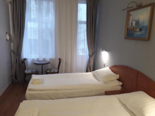 Three Dolphins Hotel with Rooftop terracе Three Dolphins Hotel with Rooftop terracе