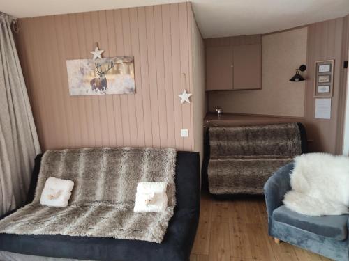 LE COSY aux pieds des pistes appartement avec balcon PLEIN CENTRE