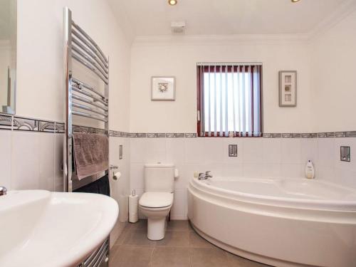 Bathroom, Cypress House with hot tub in Leven