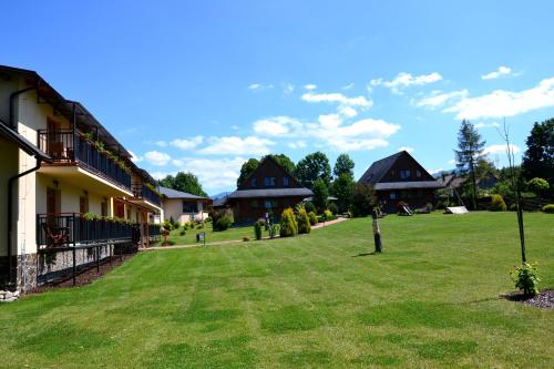 Sojka Resort - Hotel & Drevenice - Bešeňová