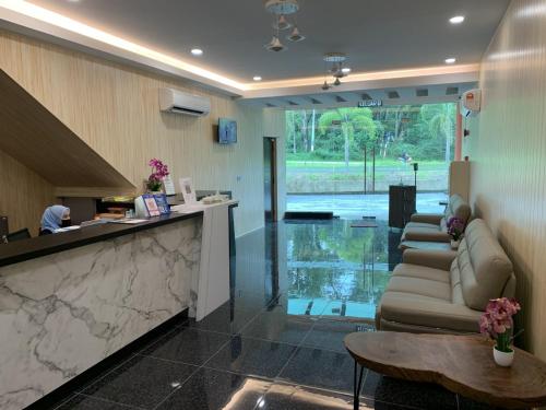 Лобби, M Quality Hotel in Гуа-Мусанн