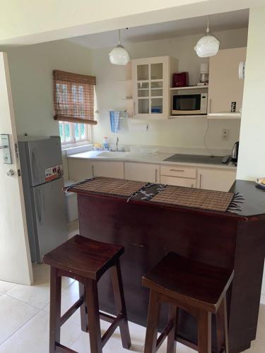 주방, 1 bedroom Penthouse Suite 63 at Mystic Ridge Resort in 오초 리오스