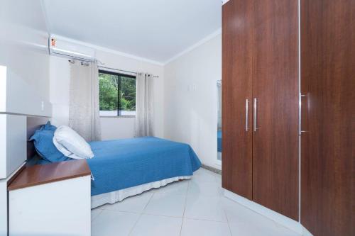 Excelente Casa 4 dormitorios para ate 12 pessoas com Lindo Jardim em Bombinhas - SC