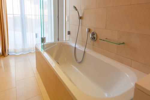 Bad, Exclusive Apartment near Ischgl with Spa Area in house in Ulmich