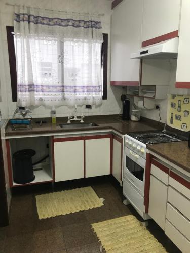 Kitchen, Enseada para familia in Enseada