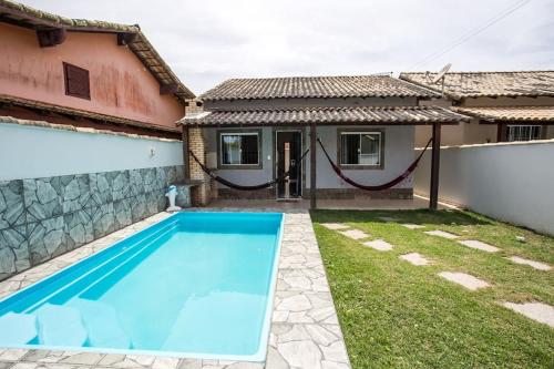 Casa com piscina, wifi e churrasqueira em unamar., Tamoios