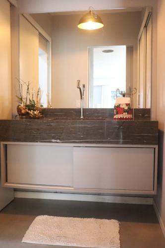 Bathroom, Casa de praia em Floripa - conforto e aconchego a 400m da praia in Praia de Daniela