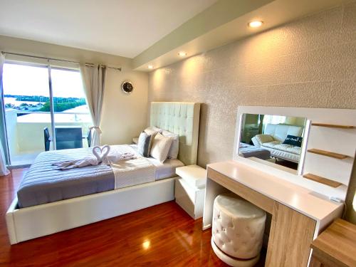 Modern waterfront apartment with pool and parking