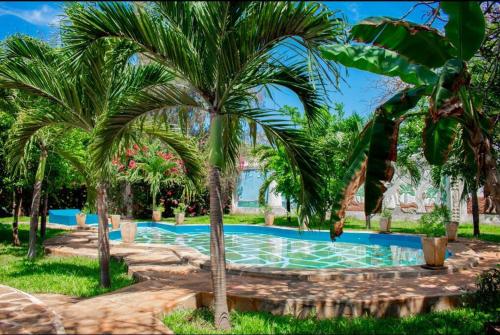 Mbuyu House Malindi - 4-Bedroom Private Villa with a Pool