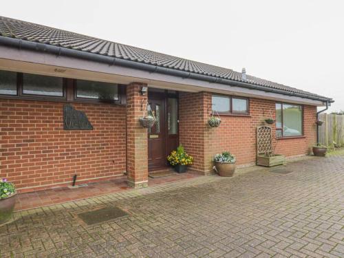 Comfortable 5-bedroom bungalow with hot tub gîte à louer Harwich