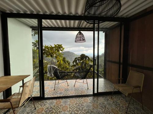 ระเบียง/ชานเรือน, Lodge Paraiso Verde in มานิซาเลส