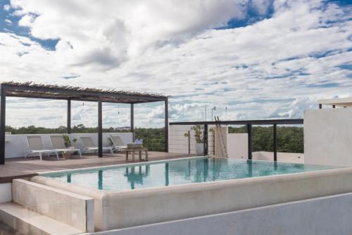Trendy Tulum Escape Condo Breathtaking View from Rooftop Terrace Infinity Pool Great Decor