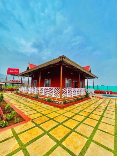 Madhu Red Stone Villa by Limestays