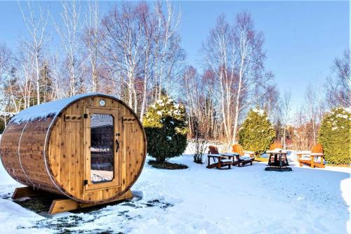 Spa, sauna et foyer : Le Phare de Baie-Saint-Paul