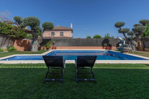  Chalet de ensueño con Piscina 4BR-8p-Sevilla, Pension in Tomares