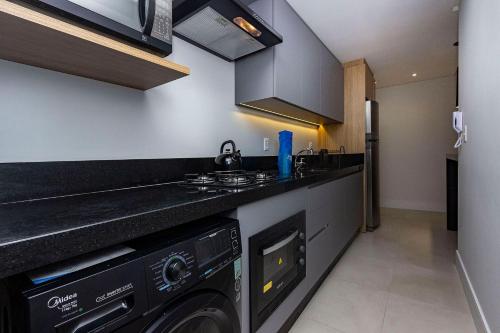 Adra 101 - Apartamento no centro de Bombinhas - Rooftop com piscina e academia - À poucos metros da praia., Bombinhas (foto 8)