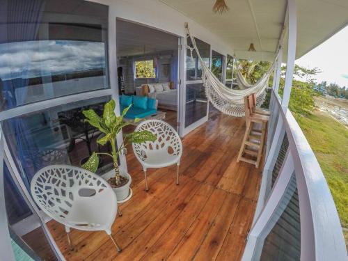 Nias Surf Villa. Beach front. Wave view! in Botohilitano