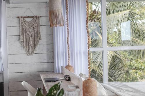 Nias Surf Villa. Beach front. Wave view! in Botohilitano