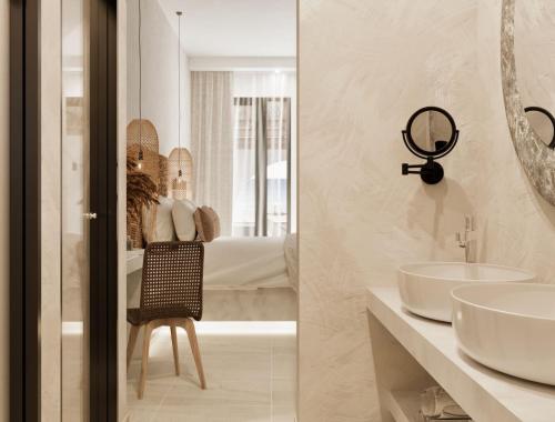 Delfini Beach Hotel & Suites Delfini Beach Hotel & Suites